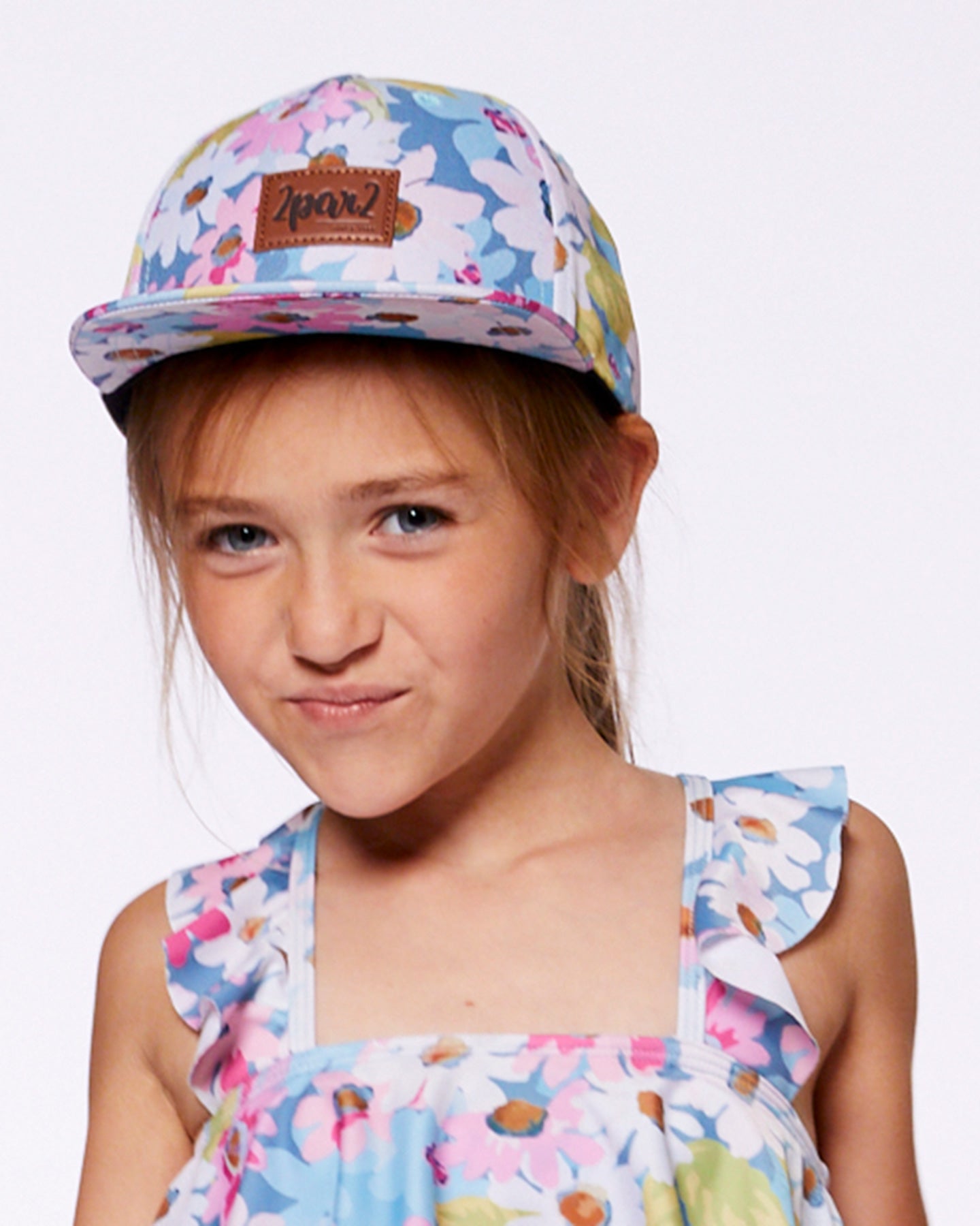 Casquette imprimée à fleurs blanches, roses et vertes G30VGC