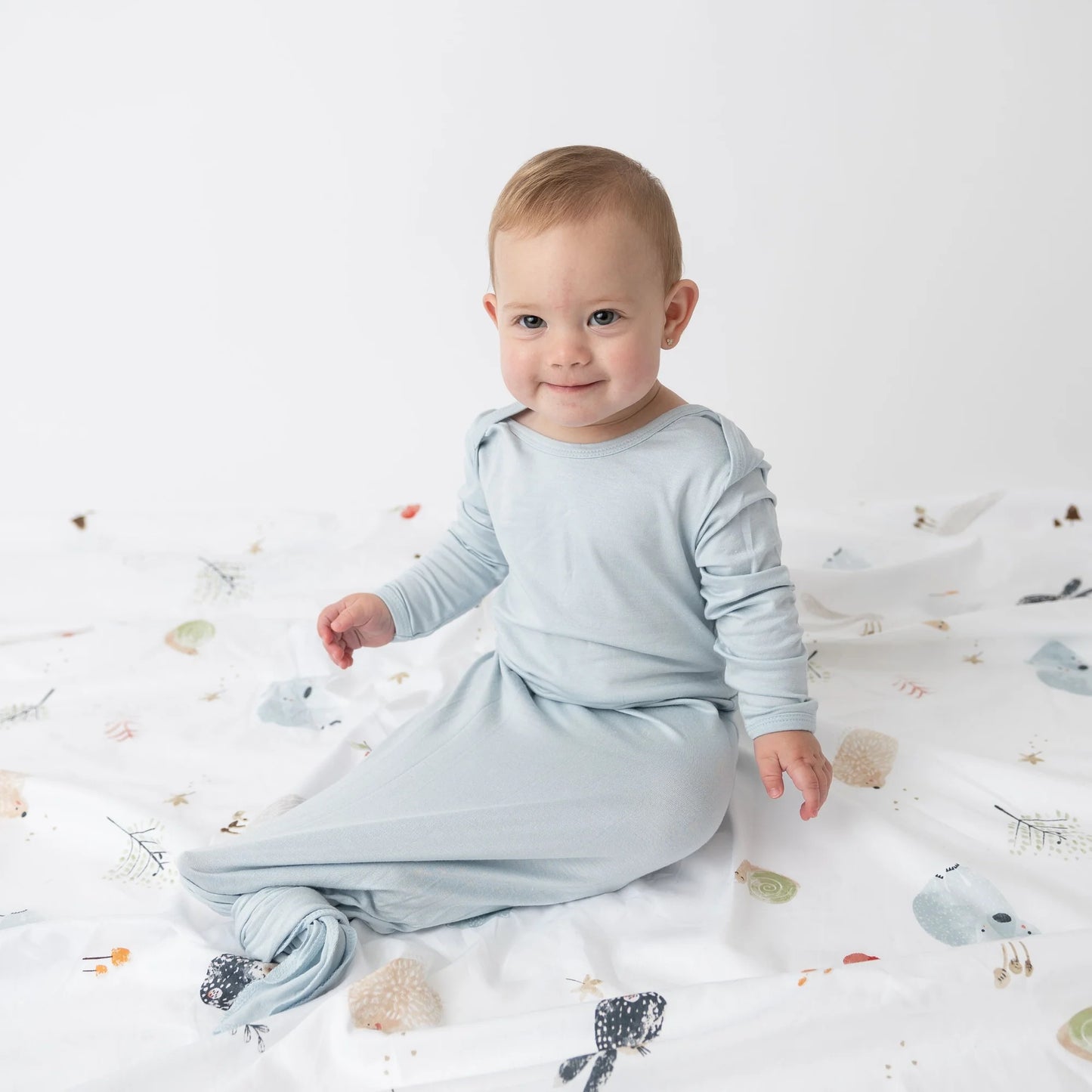 Boutique Petites Fleurs - Dormeuse à nœud pour bébé Komfies Rose bleue